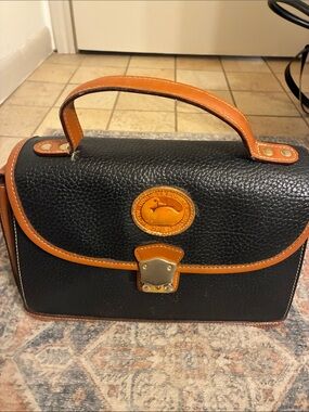 Dooney & Bourke Black Pebbled Leather Top-Handle Satchel with Brown Trim